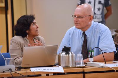 Vilma Morales Quillama, Peru, speaks to Joe DiGangi, IPEN Senior Advisor. Photo by Earth Negotiations Bulletin.