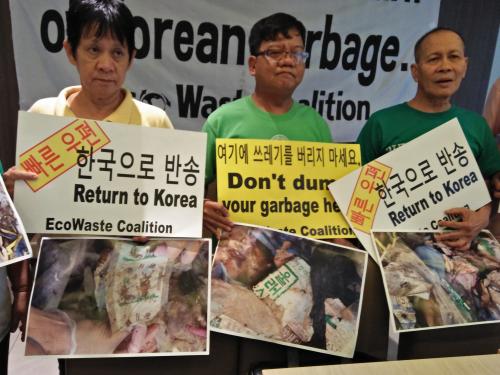 BACK TO KOREA: Green activists from Buklod Tao and the EcoWaste Coalition laud impending re-exportation of garbage imported from South Korea this January, as confirmed by the Bureau of Customs, as a victory for environmental justice.  